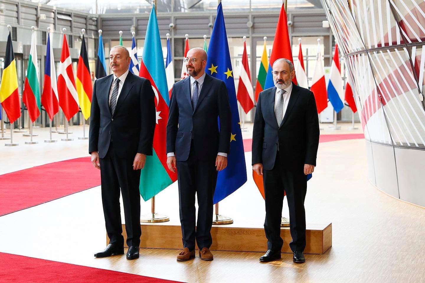 What was discussed at the tripartite meeting in Brussels?