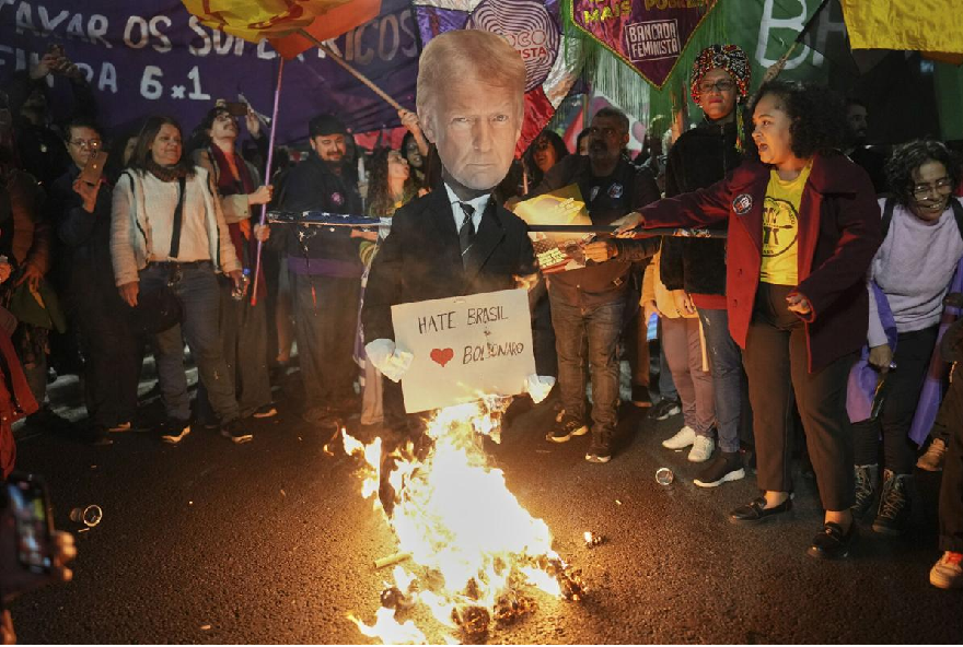 Protesters in Brazil burn an effigy of Trump against new tariffs