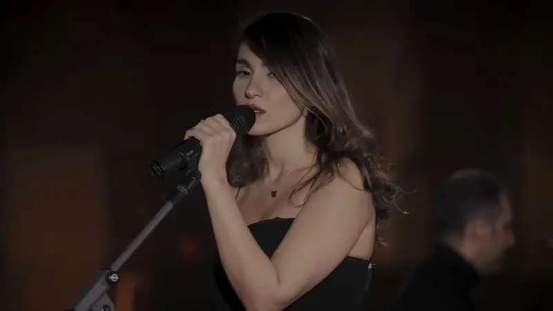 A singer who performed without a hijab is being persecuted in Iran